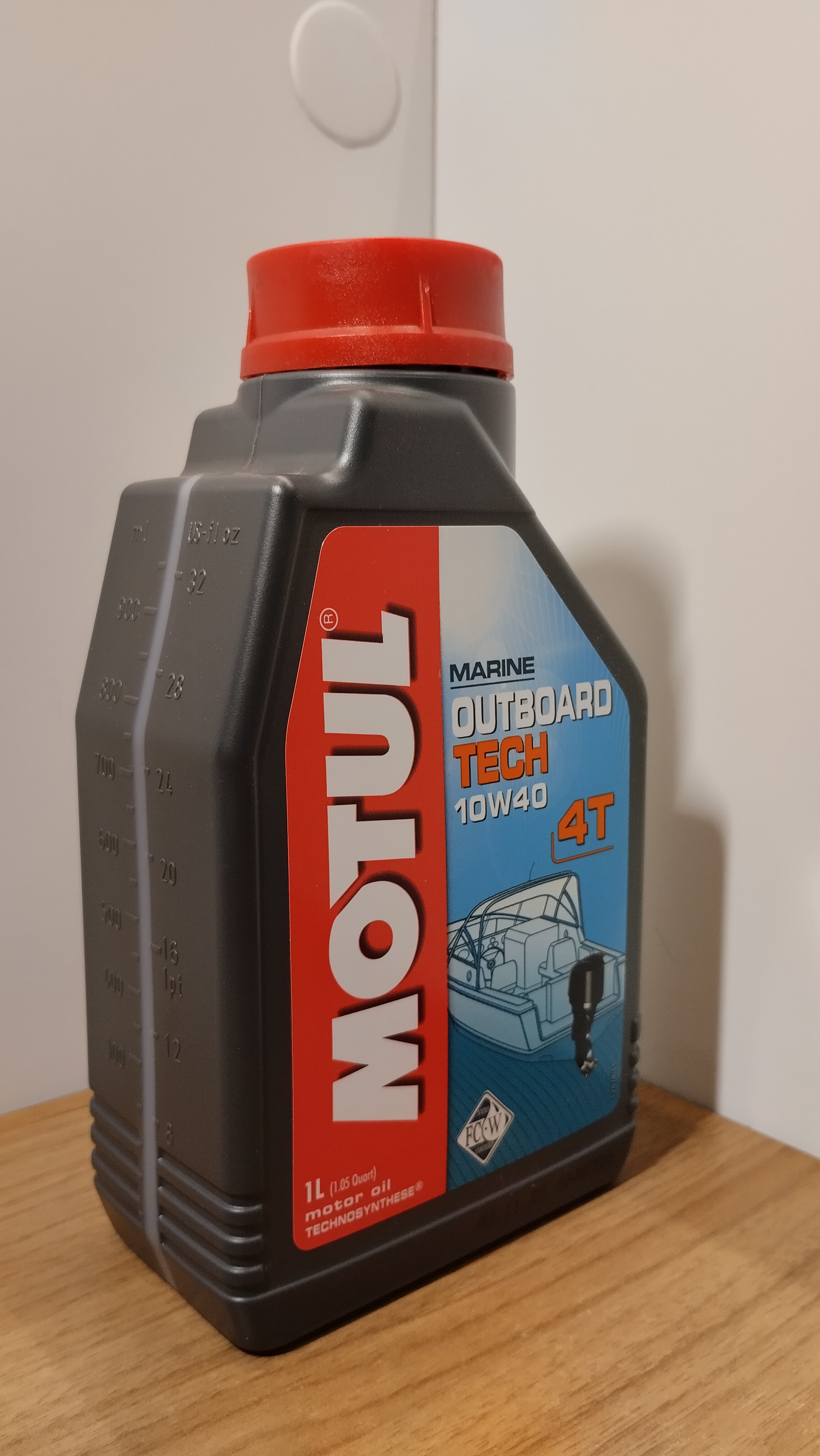   Motul Outboard TECH,  4T 10W40 (1 )    .  1